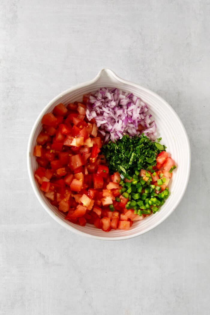 Pico de gallo ingredients in a bowl