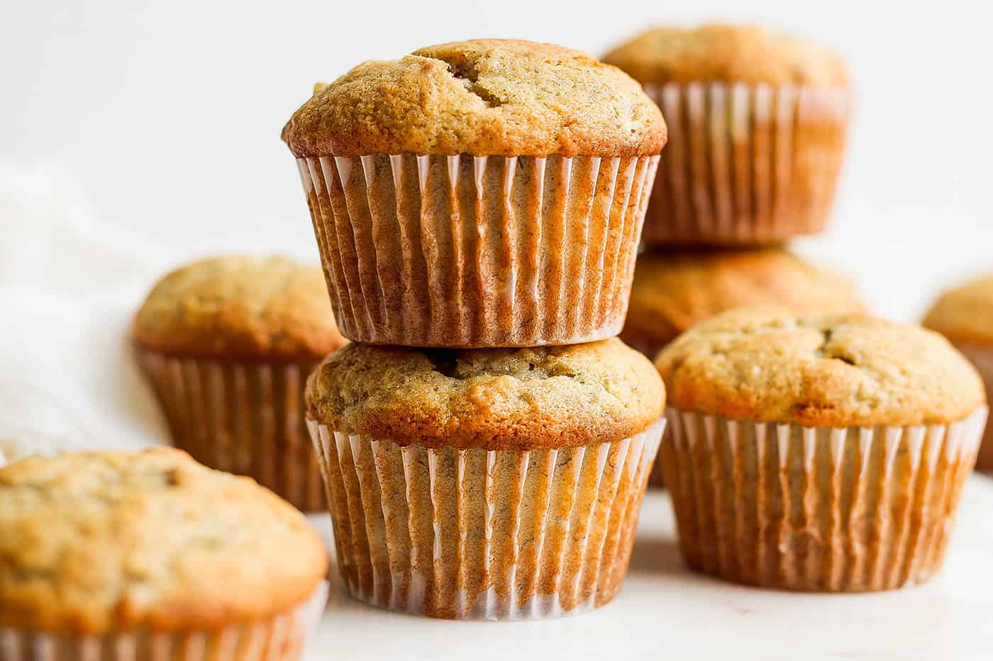 a stack of banana bread muffins