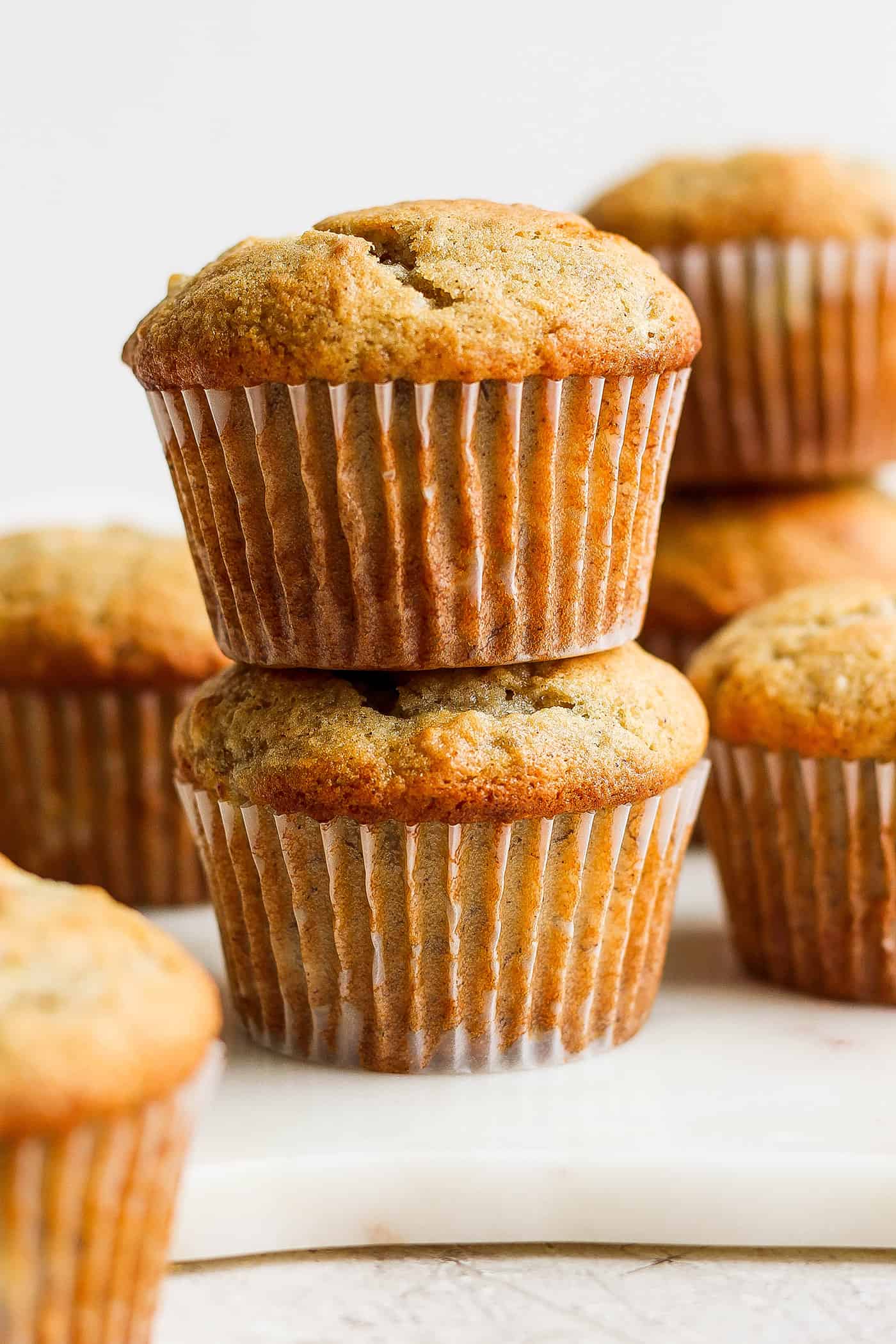 a stack of banana bread muffins