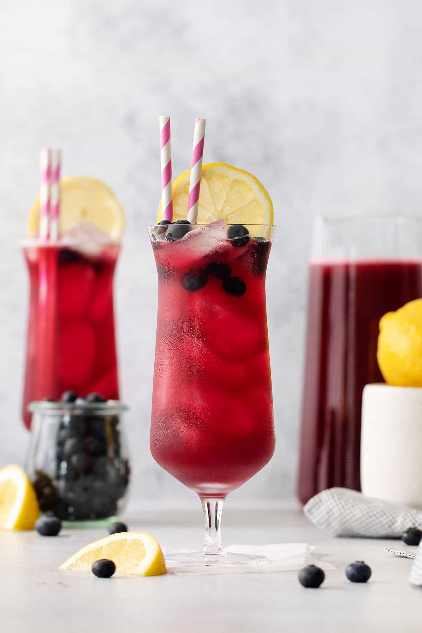 This Blueberry Lemonade is the perfect summertime drink! It’s fruity and refreshing with tart lemons and sweet blueberries. Two glasses of blueberry lemonade