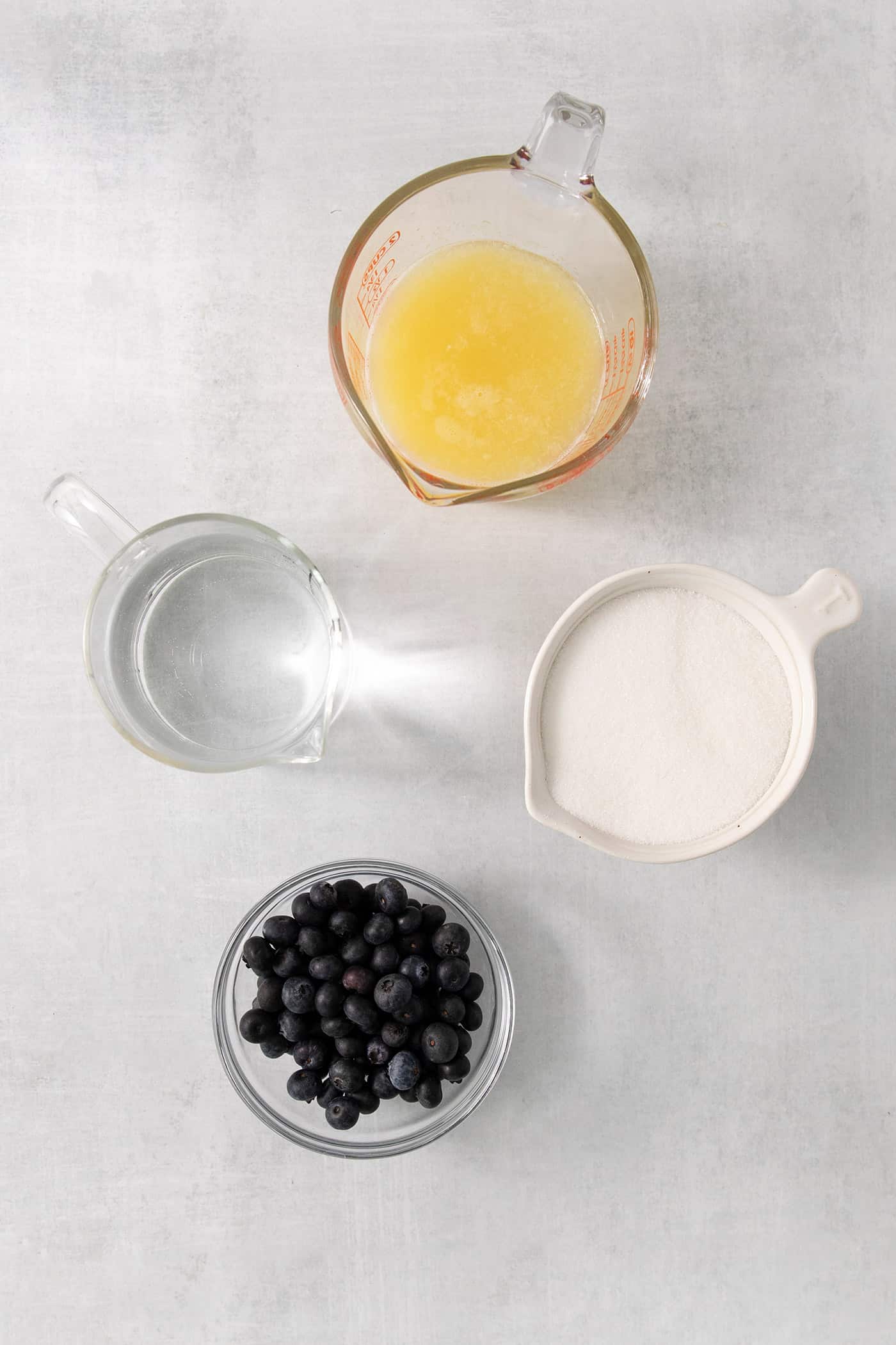 Overhead view of blueberry lemonade ingredients