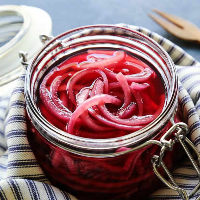 a jar of pickled red onions