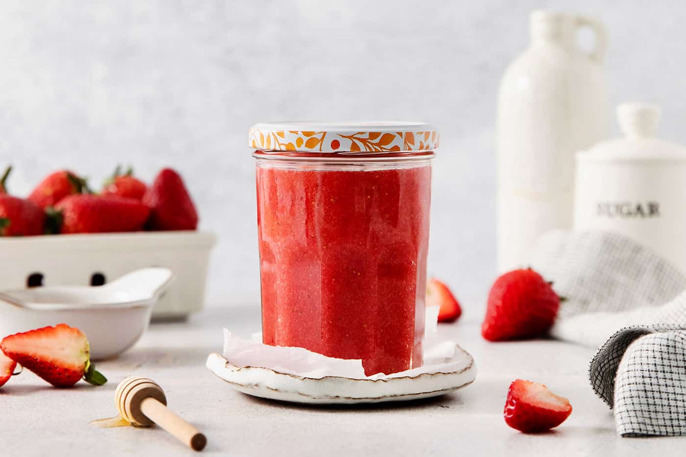 a jar of homemade strawberry sauce