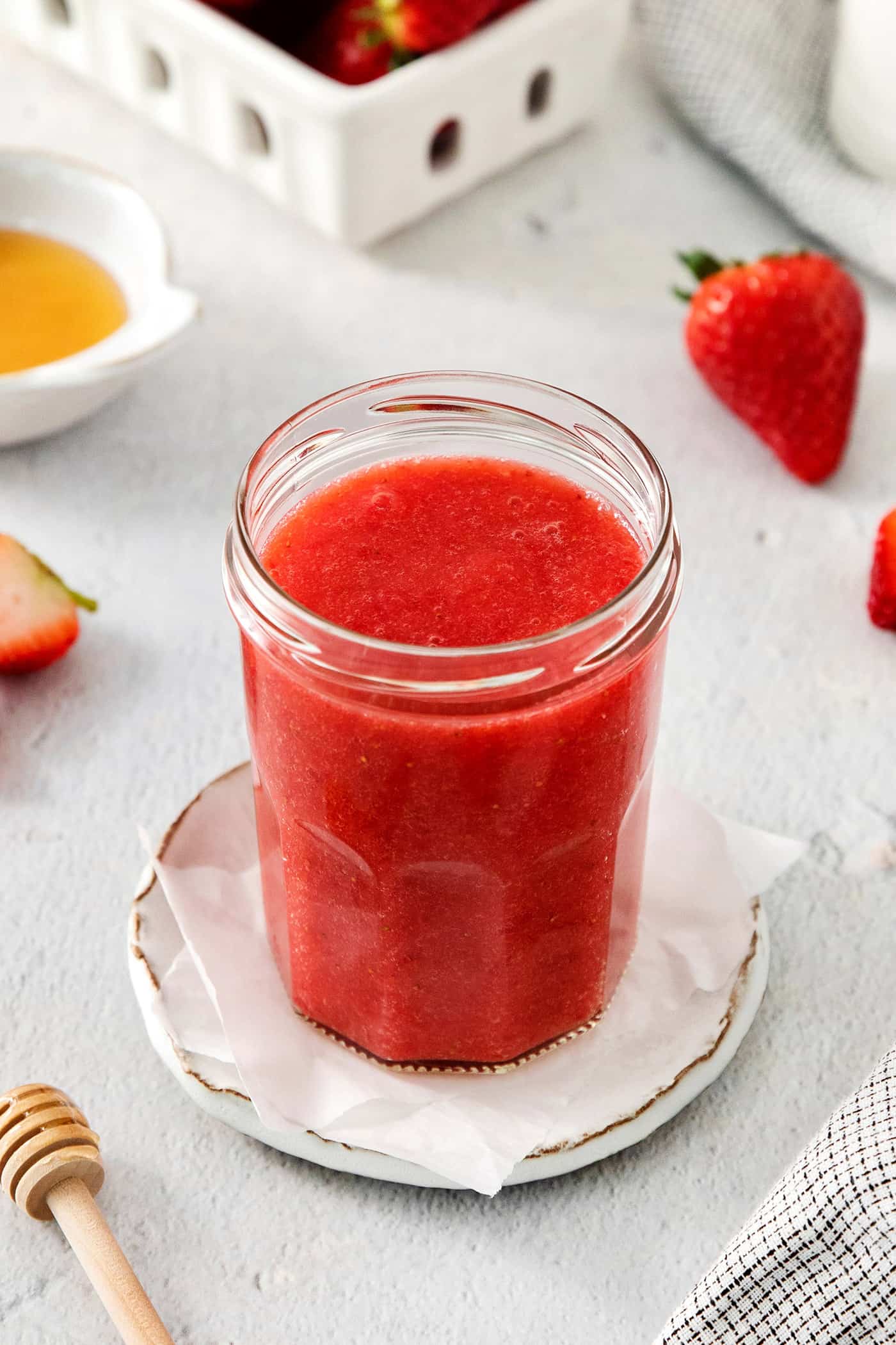 a jar of fresh homemade strawberry sauce