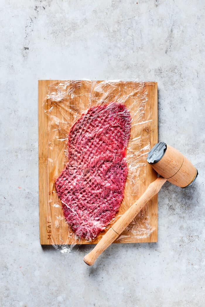 Prepping a beef strip.