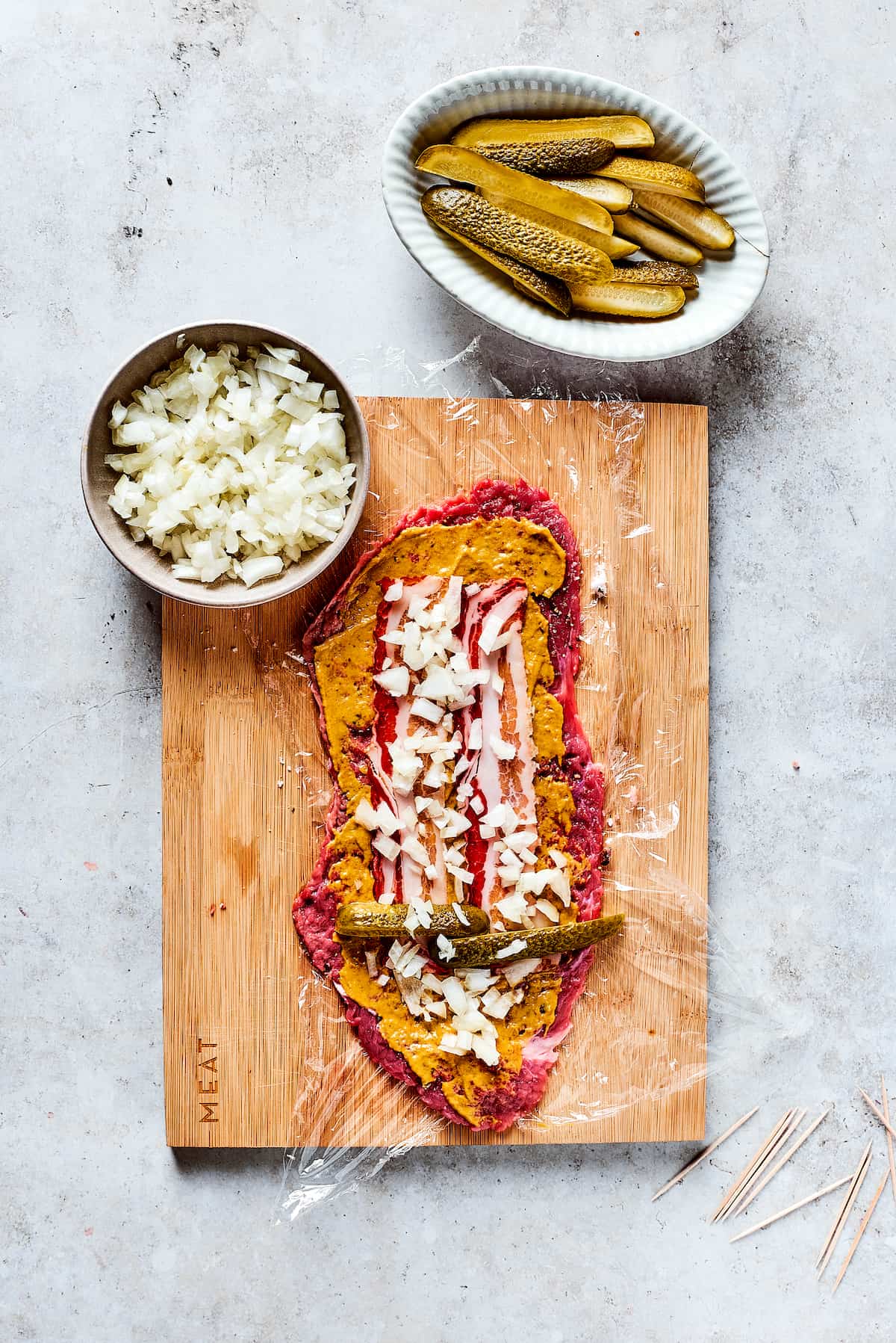 Adding filling to a beef strip.