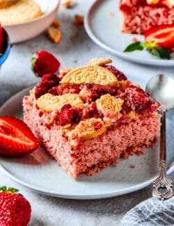 a piece of strawberry cake with a crunchy topping