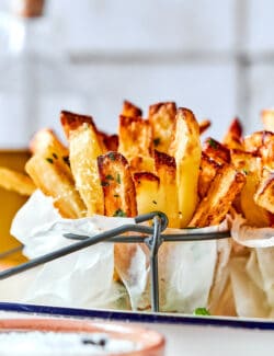 Truffles fries in paper with dip.