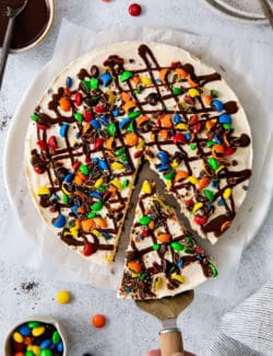 Overhead view of a slice of ice cream pizza being served