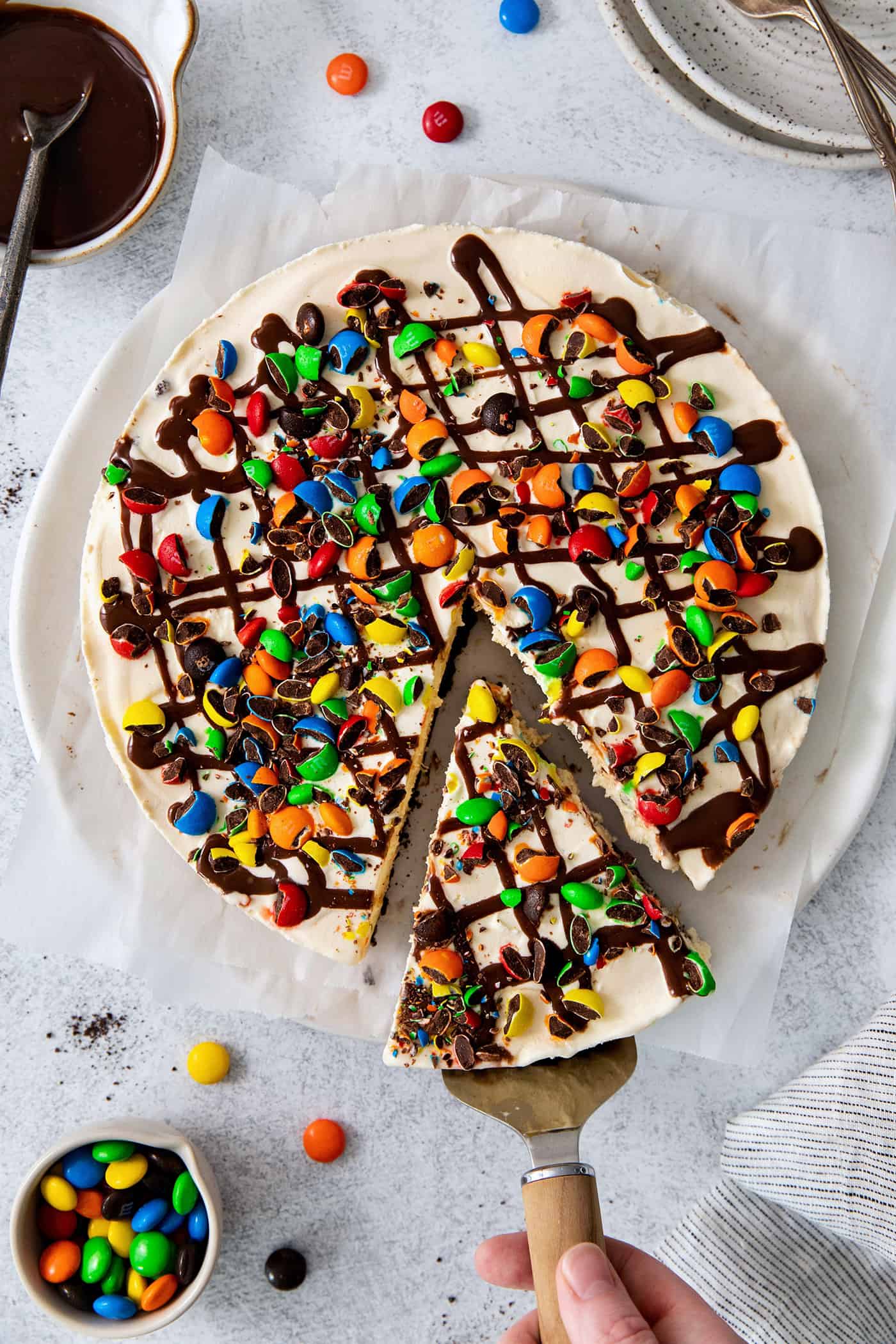 Overhead view of a slice of ice cream pizza being served