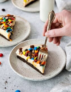 A fork diving into a slice of homemade ice cream pizza