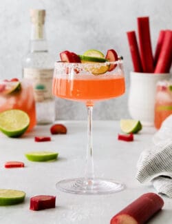 a stemmed cocktail glass of margarita with rhubarb
