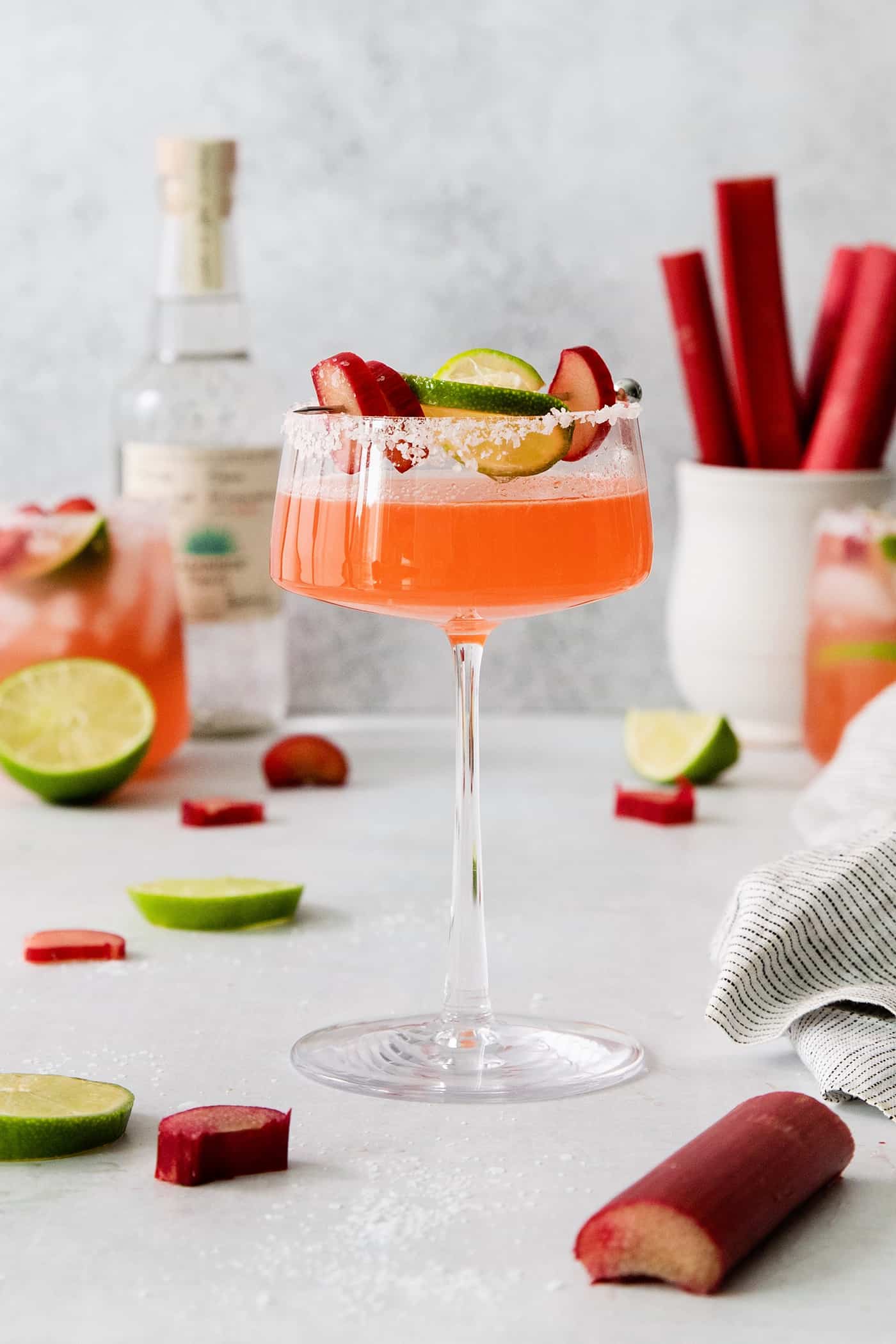 a stemmed cocktail glass of margarita with rhubarb