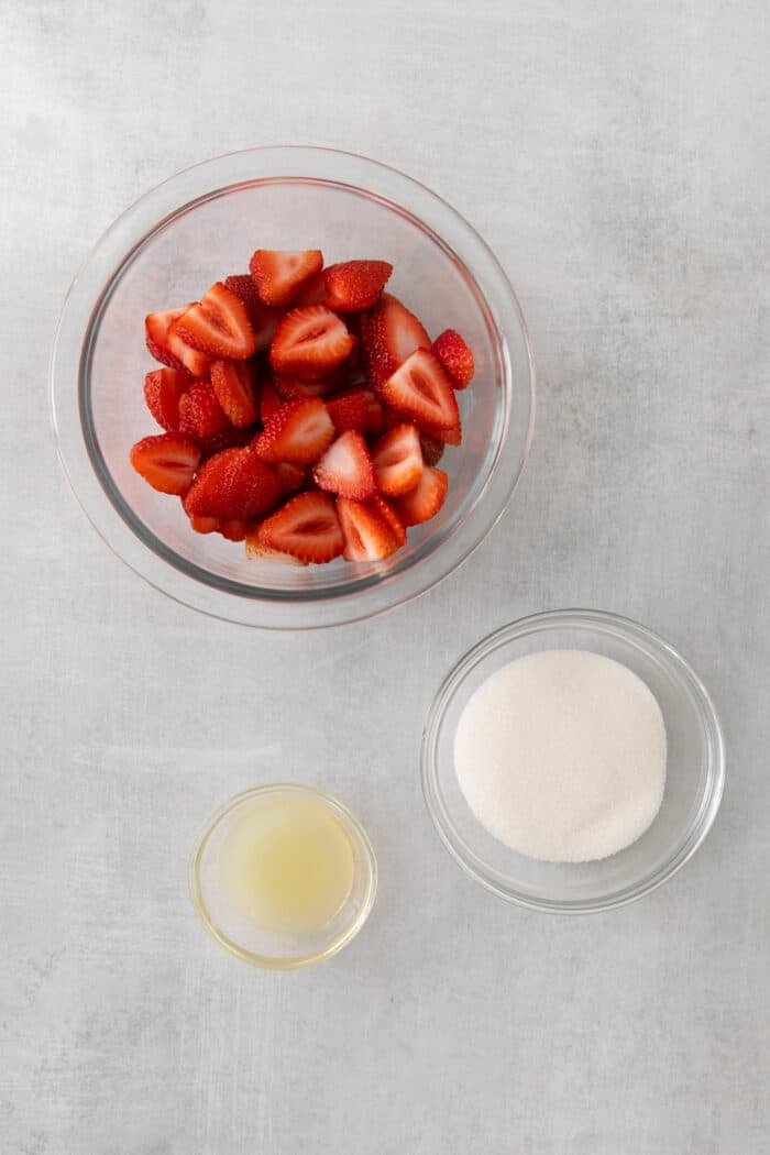 Ingredients to make a strawberry syrup