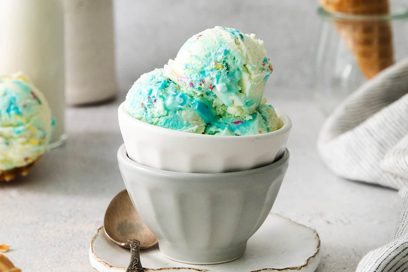 A bowl of blue birthday cake ice cream.