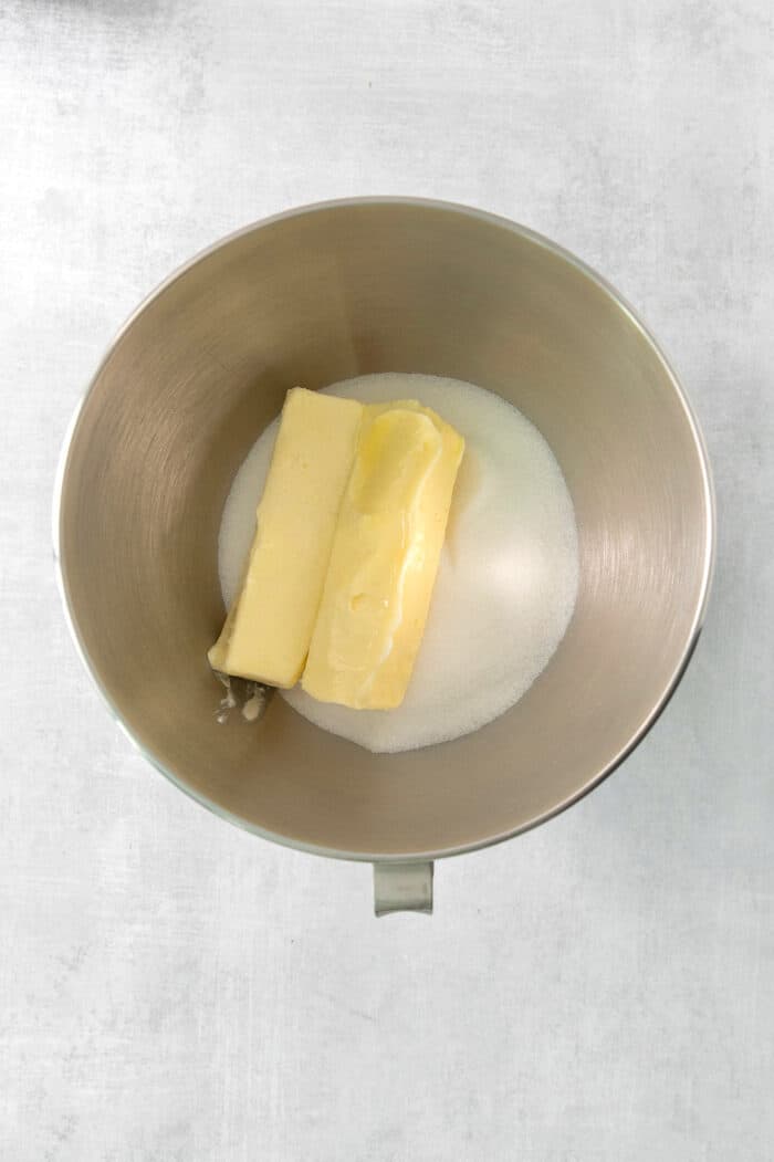 Butter and sugar in the bowl of a stand mixer.