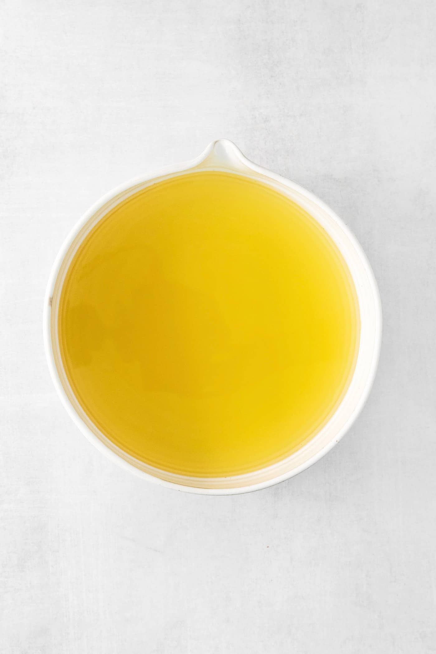 A bowl of strained limoncello.