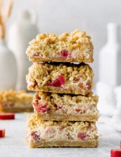 A stack of rhubarb cream cheese bars.