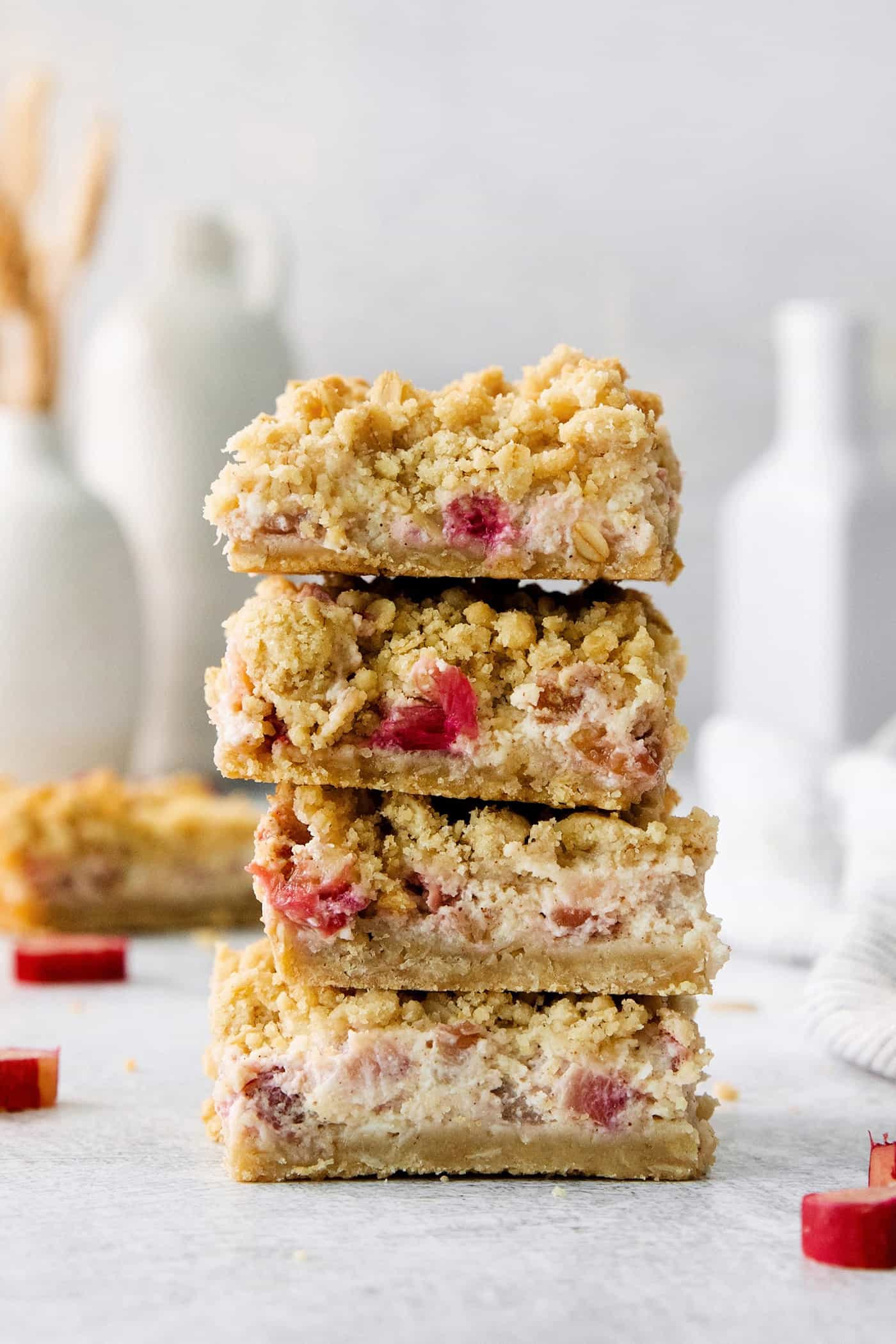 A stack of rhubarb cream cheese bars.