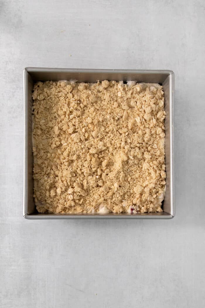 The crumble topping on top of rhubarb cream cheese bars.