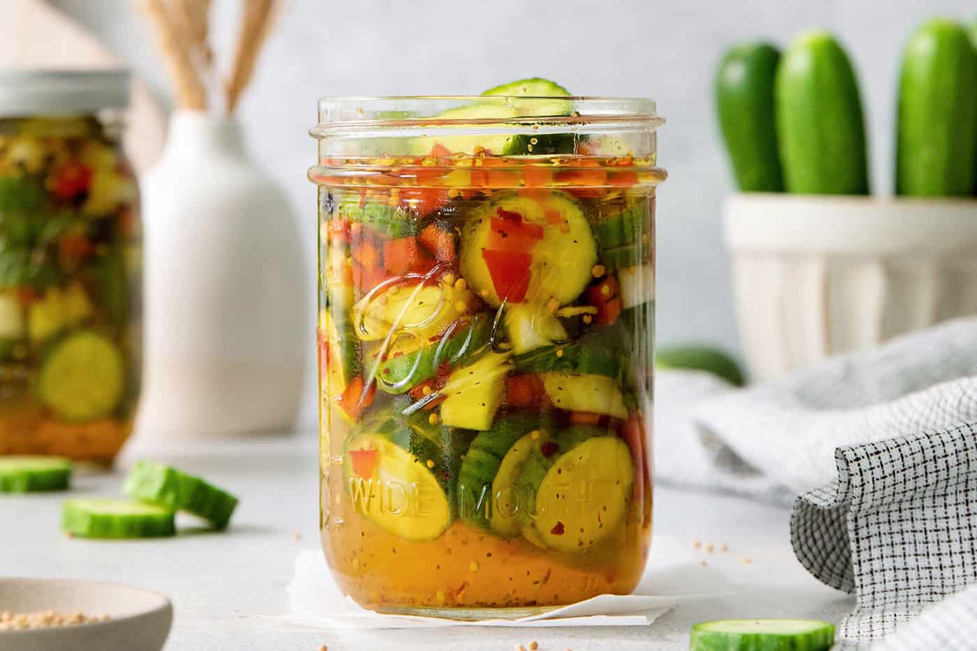 A jar of sweet and spicy pickles.