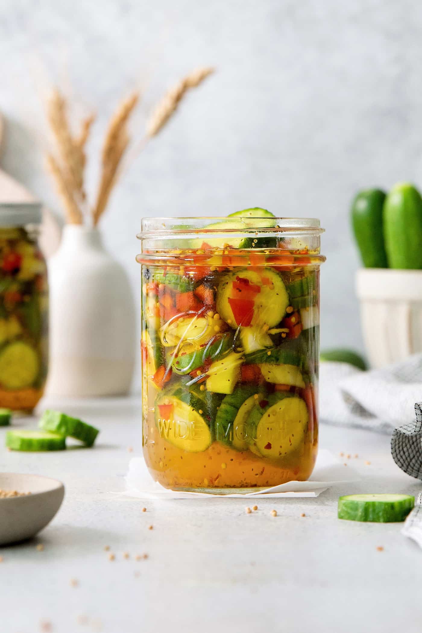 A jar of sweet and spicy pickles.