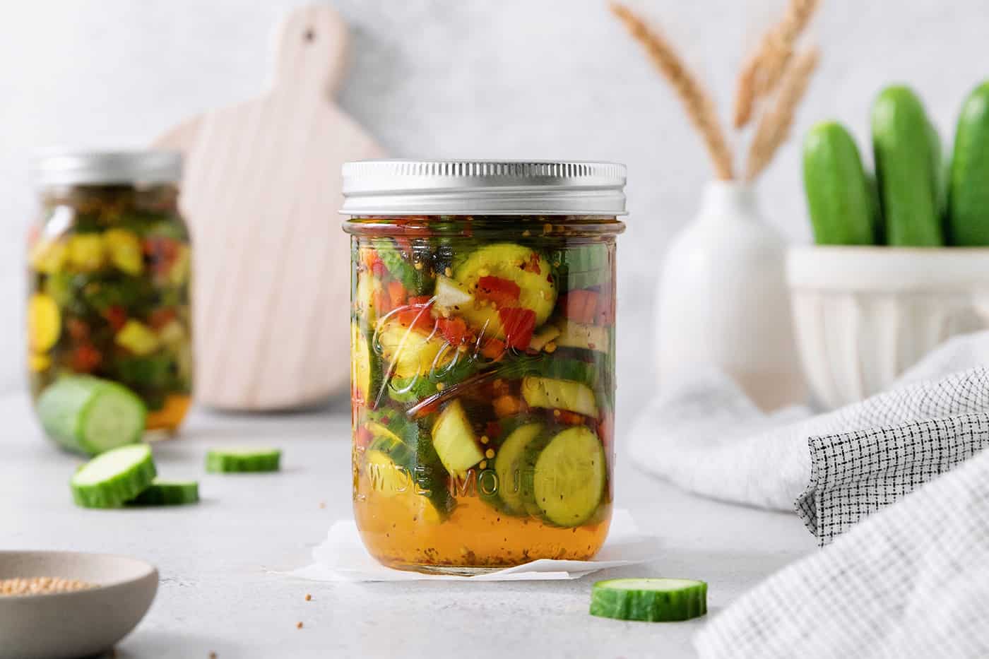 A jar of sweet and spicy pickles.