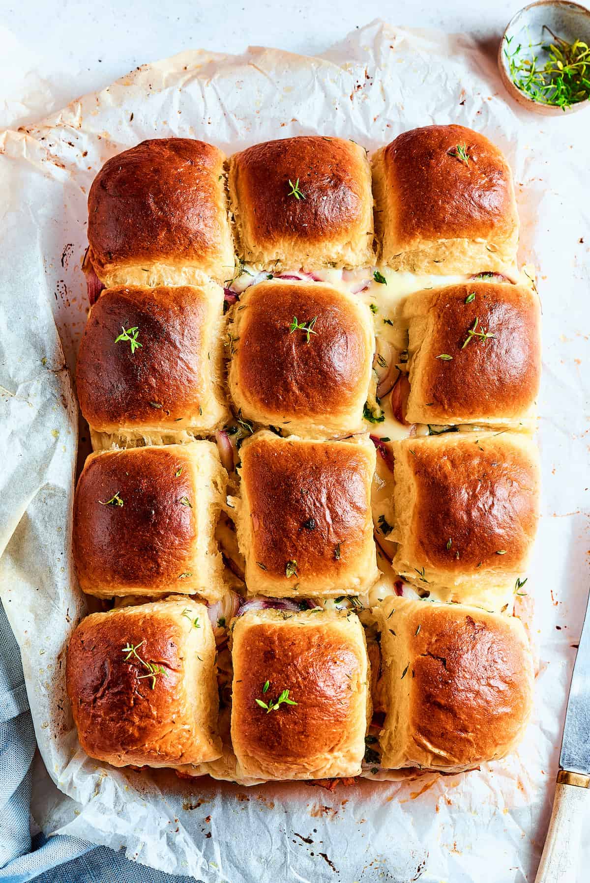 An overhead shot of BBQ chicken sliders.