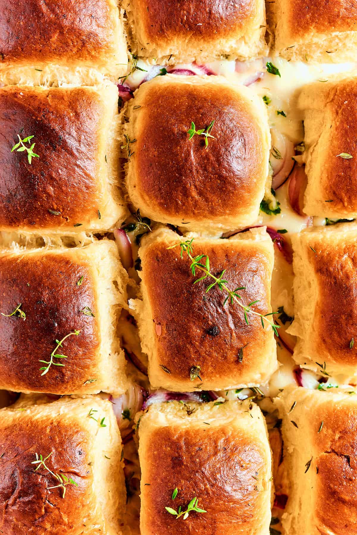 An overhead shot of BBQ chicken sliders.