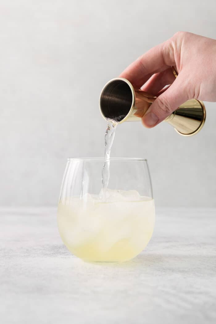 Club soda tops a glass of limoncello.