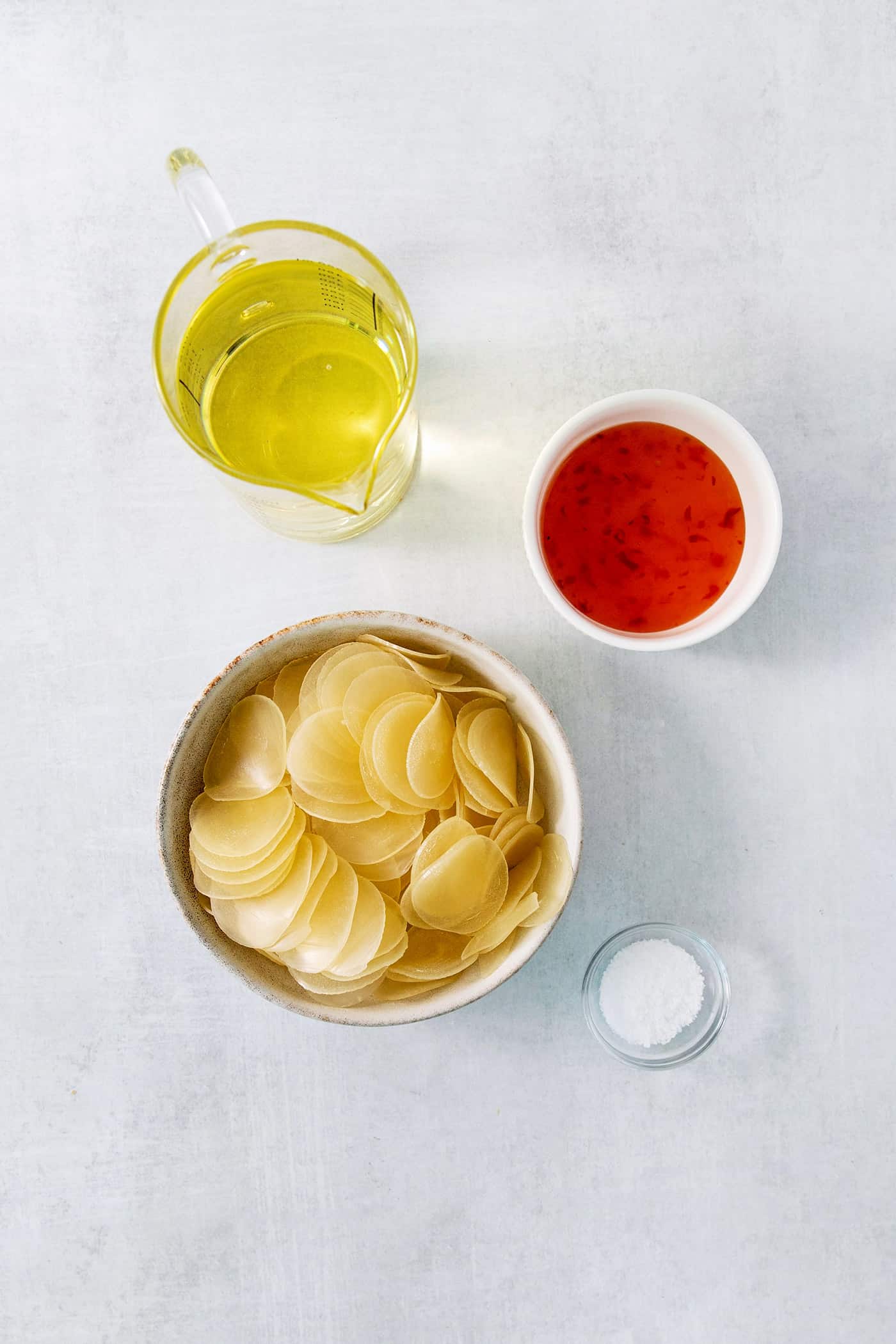 Ingredients for shrimp chips: prawn crackers, oil, salt, vinegar.