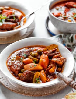 Bowls of Mulligan stew are shown on a table.