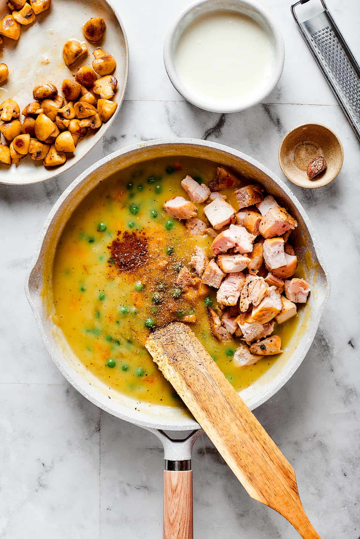 Roasted turkey is added to the pot of Turkey a La King.