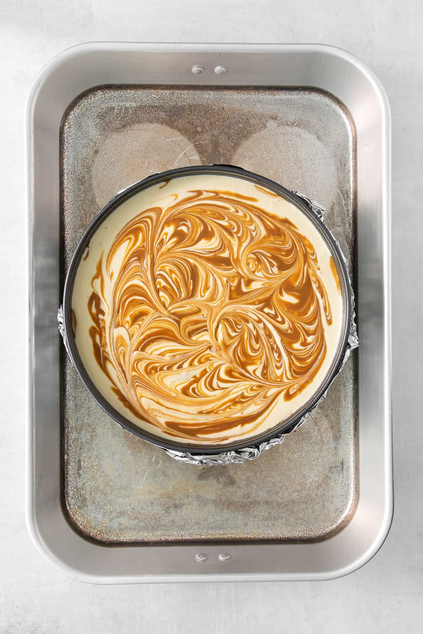Cookie butter is swirled into a cheesecake base.