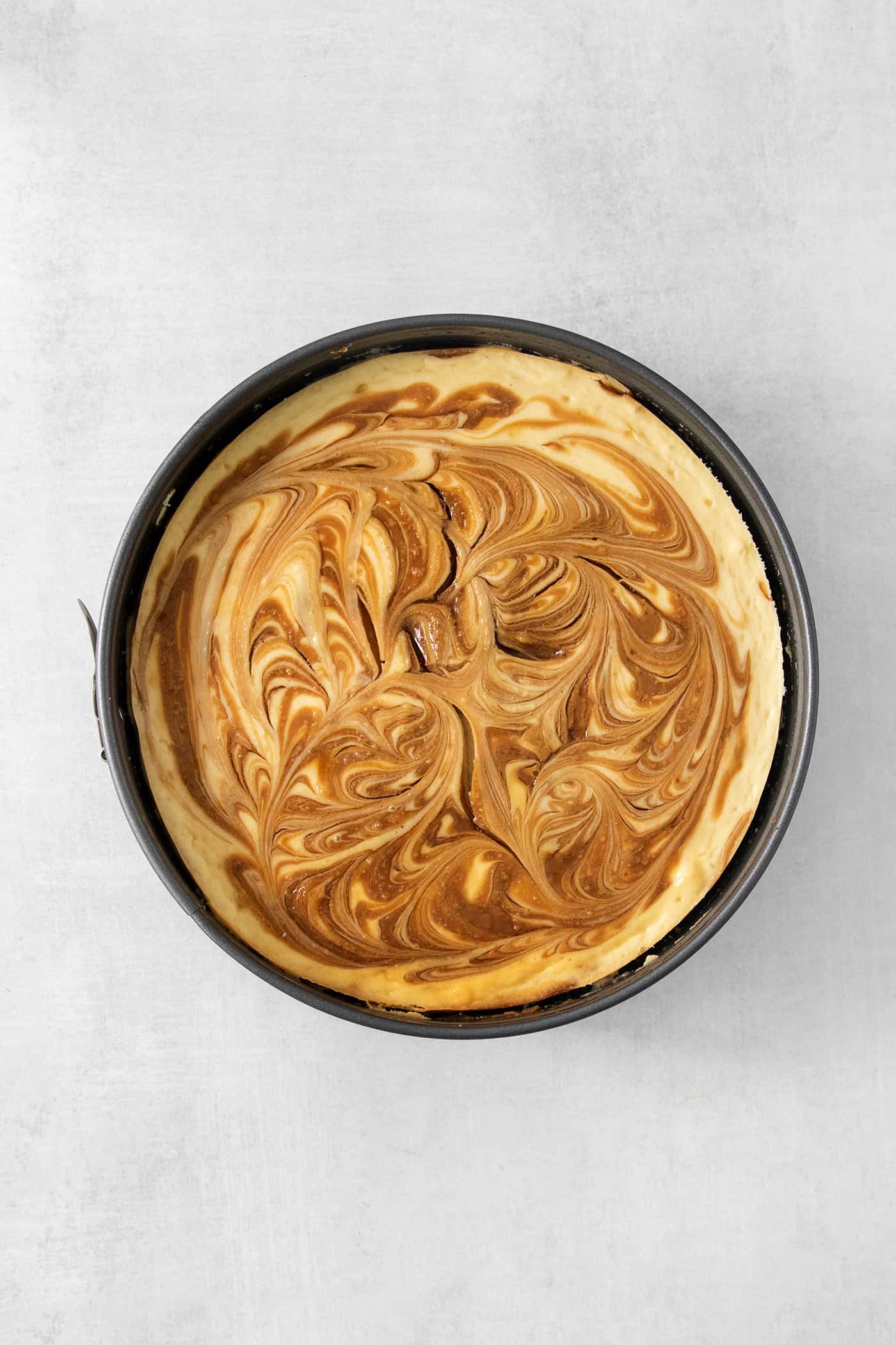 Cookie butter is swirled into a cheesecake base.
