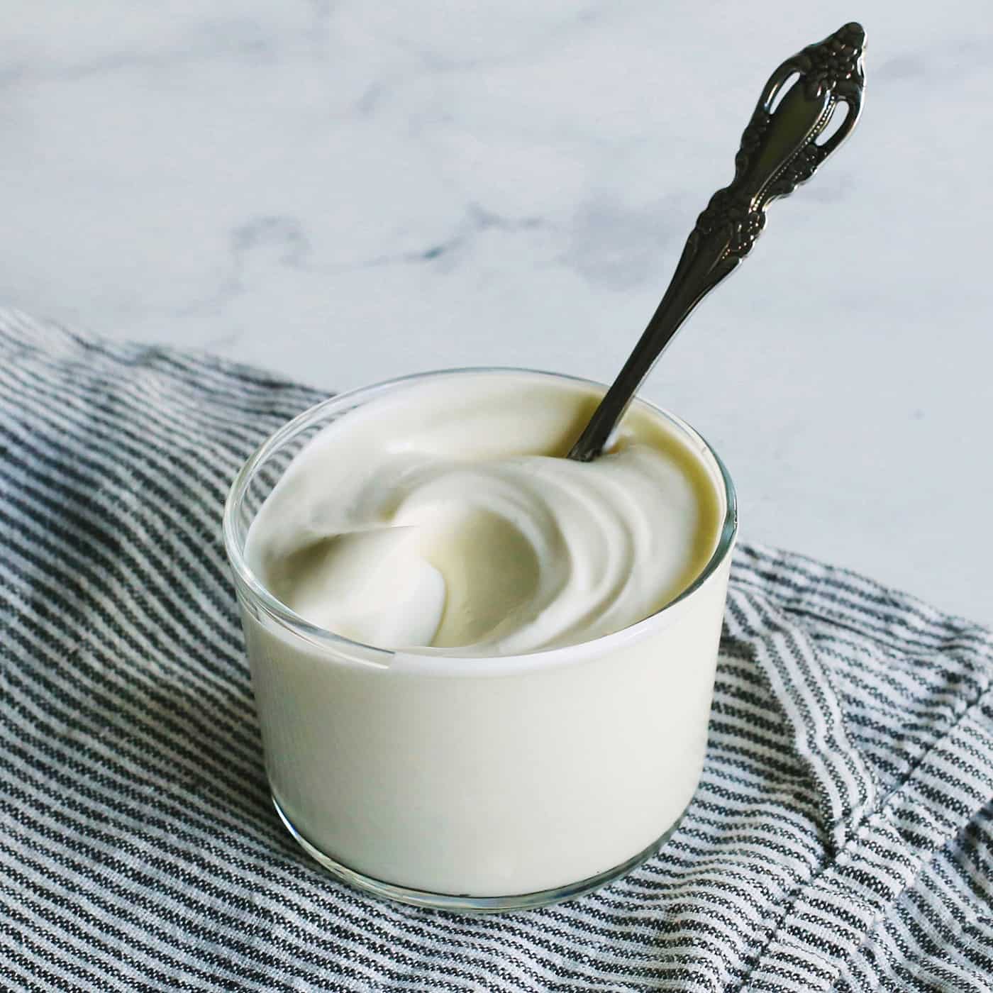 a small clear cup of creme fraiche