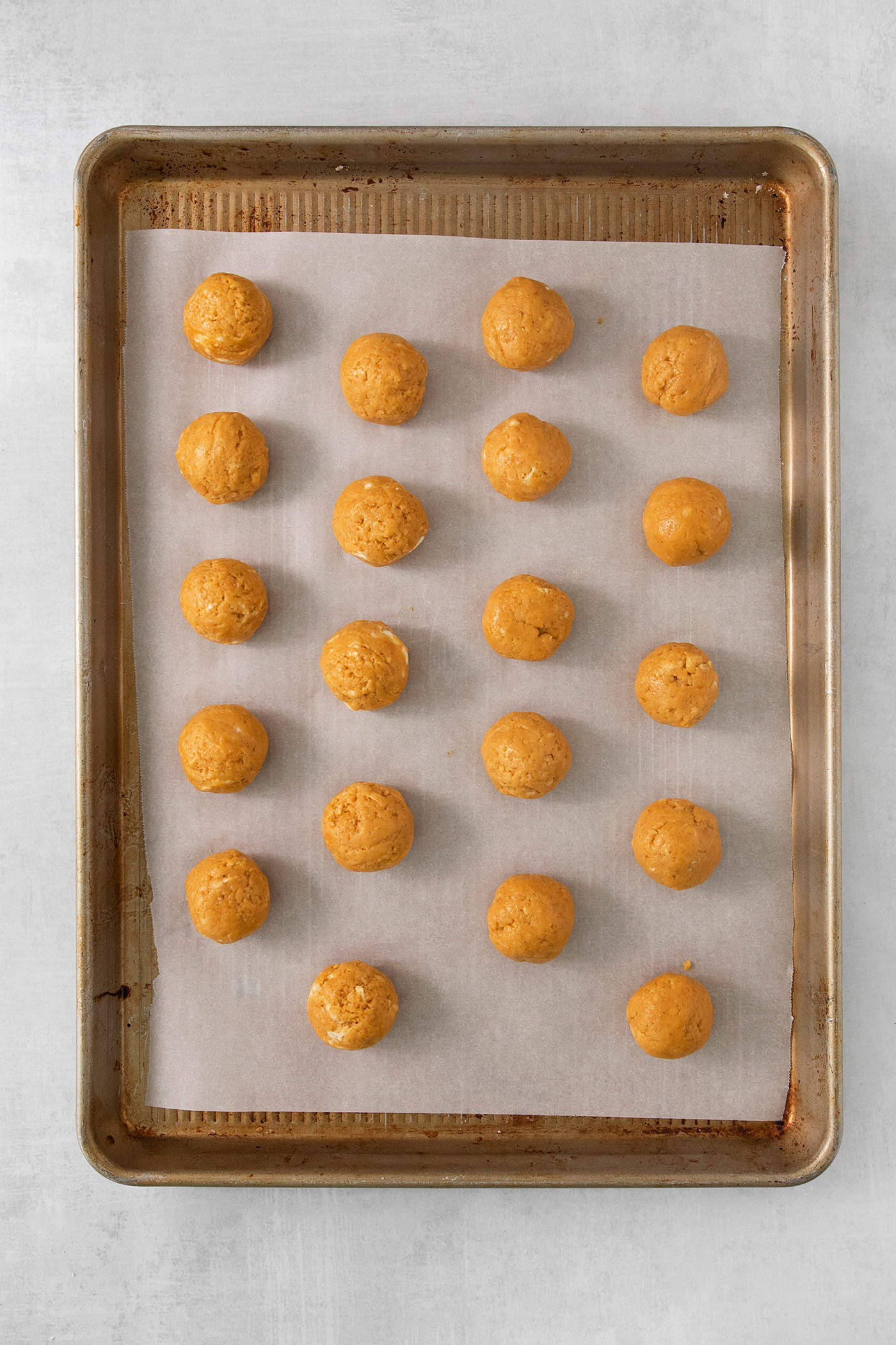 A tray of pumpkin pie truffles before being dipped in chocolate.