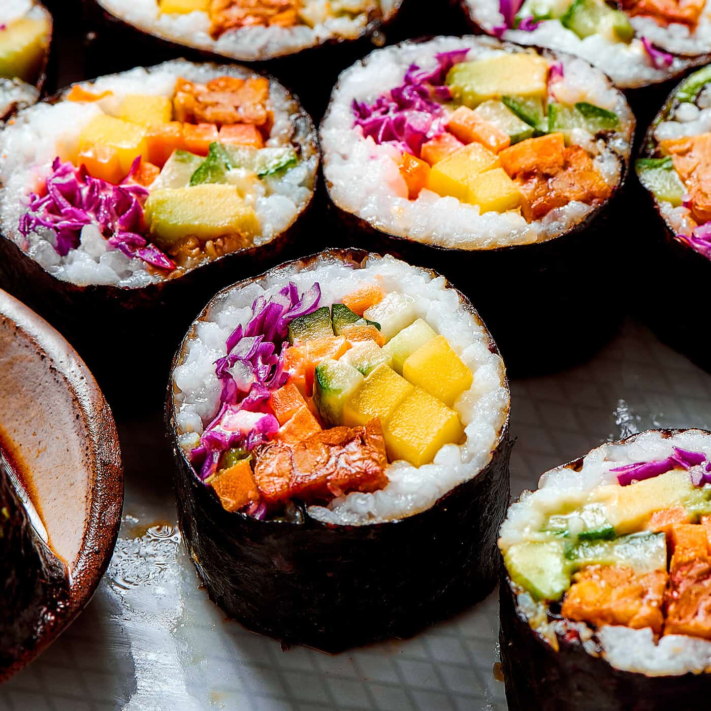 close-up photo of sushi rolls made with vegan ingredients