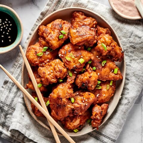 overhead photo of mochiko chicken on an oval platter