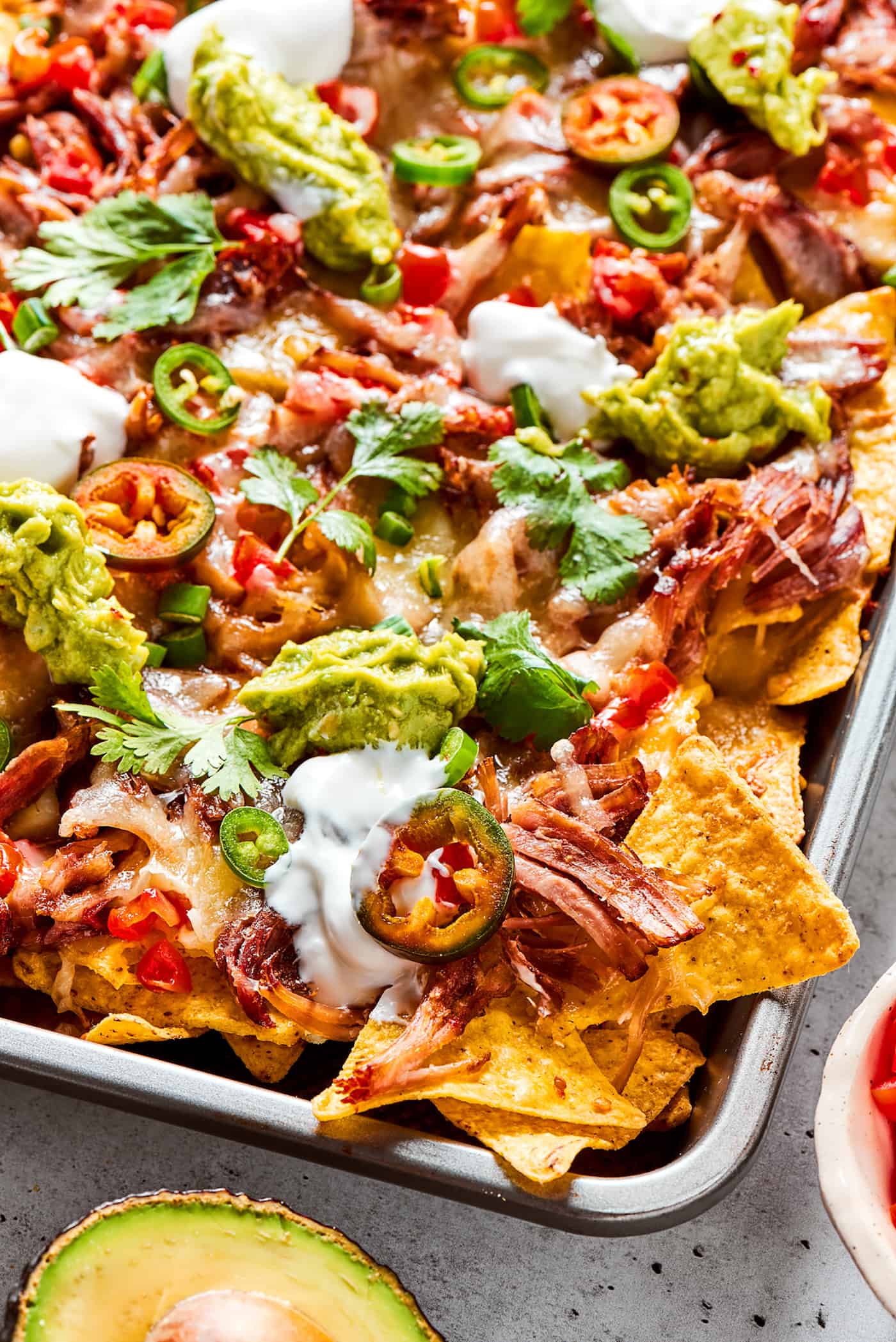 a sheet pan of baked nachos