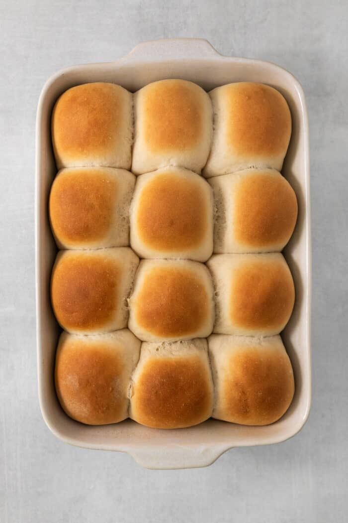 A baking pan of baked rhodes rolls.