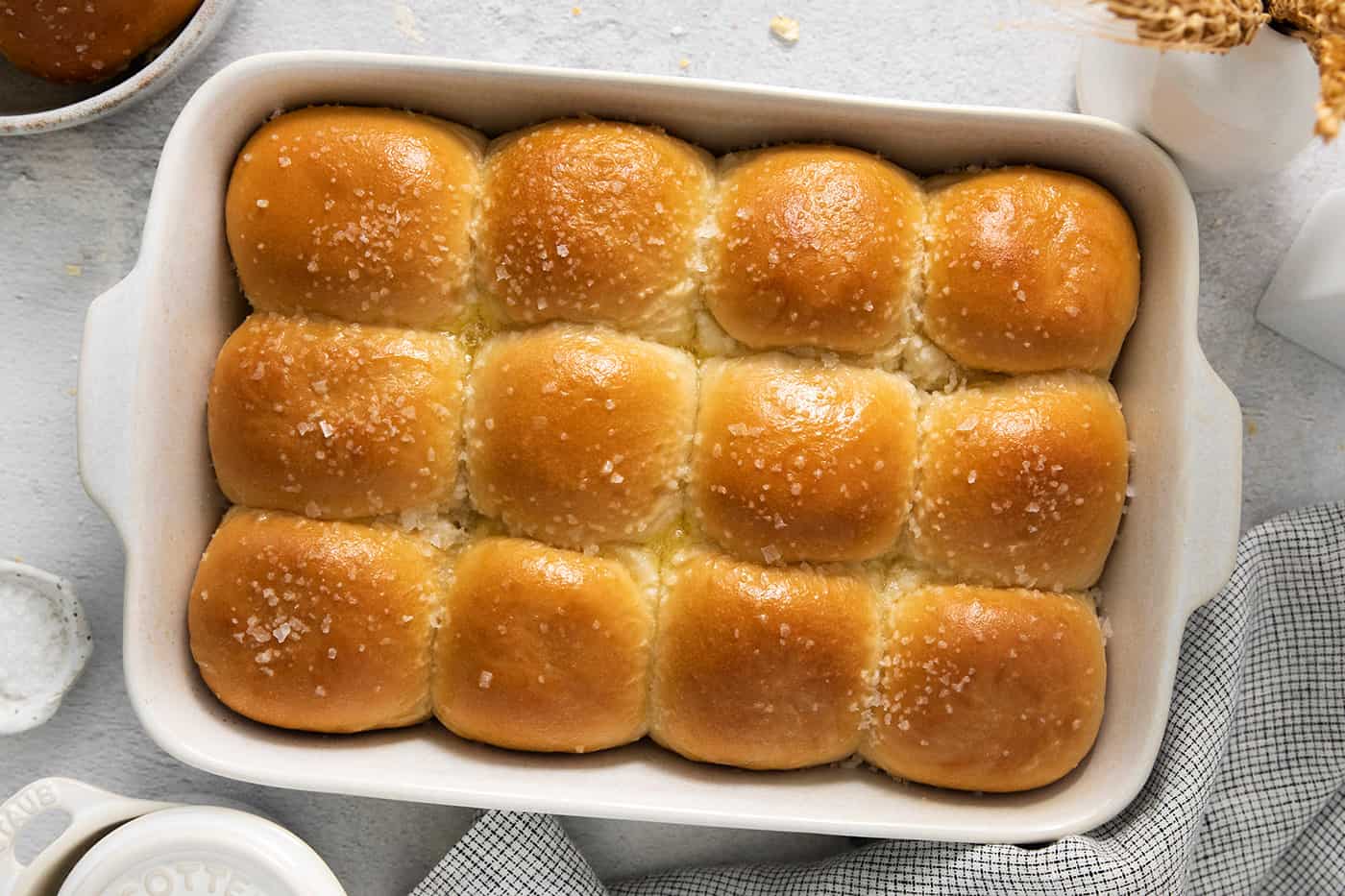 A pan of baked rhodes rolls.