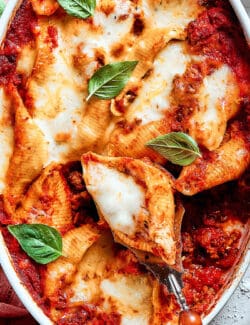 Pinterest image for cheesy stuffed shells with meat