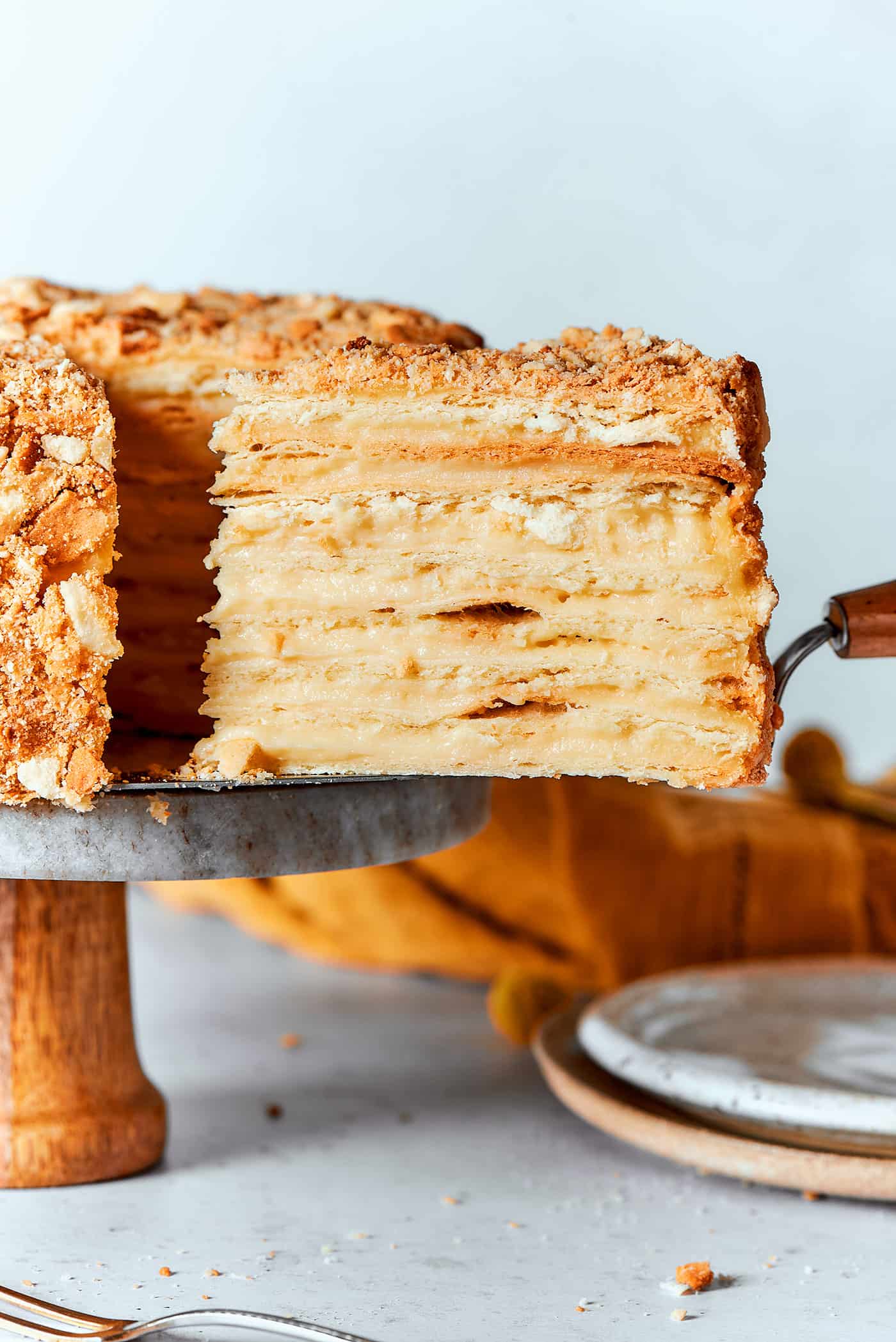 removing a piece from the Napoleon cake