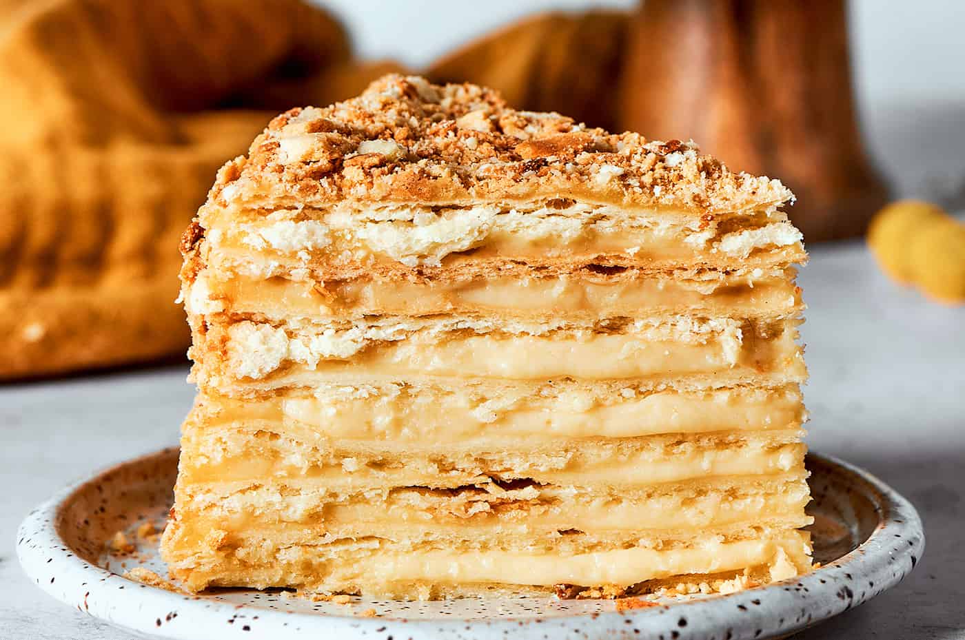 a piece of Napoleon cake on a plate