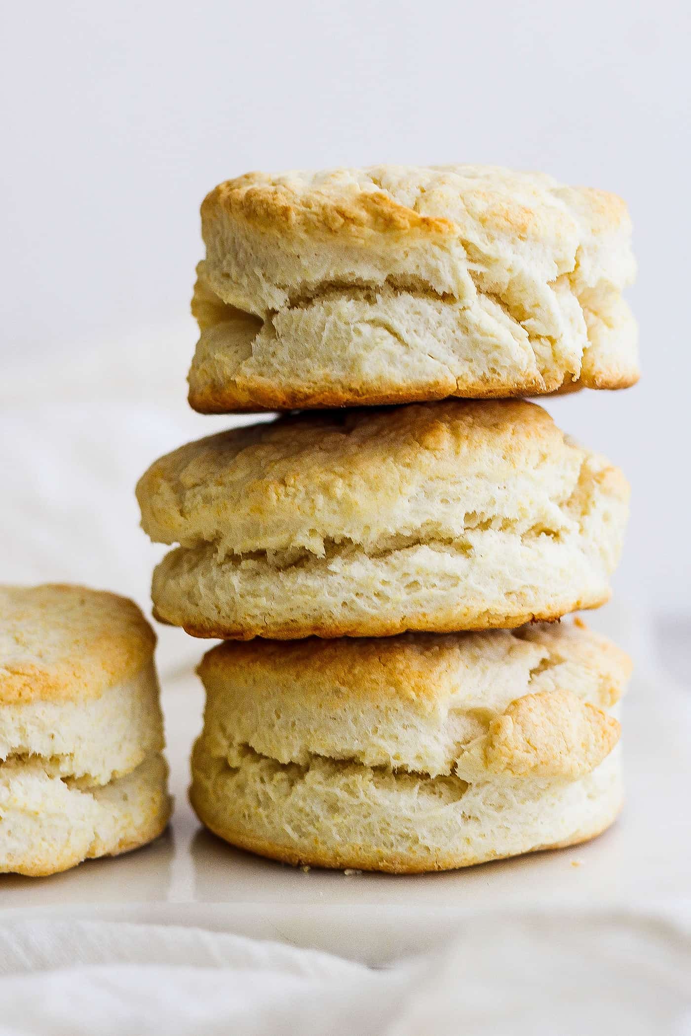 A stack of three cream biscuits.