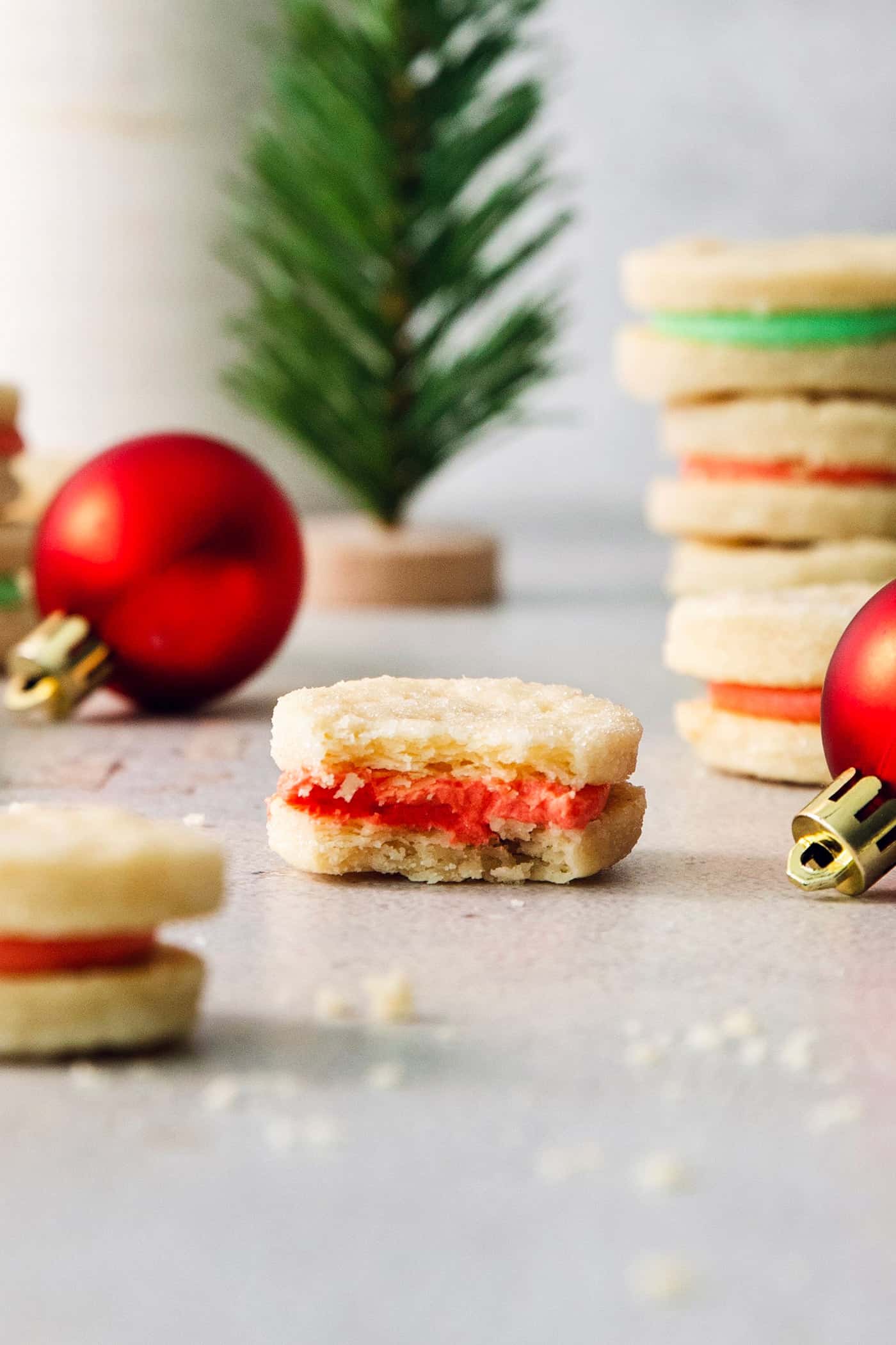 Cream wafer cookies are shown, with a cookie with a bite taken out.