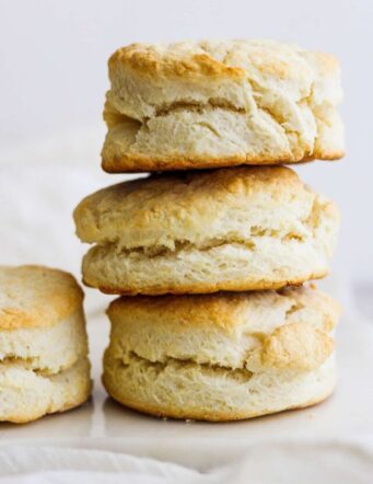 A stack of three cream biscuits.