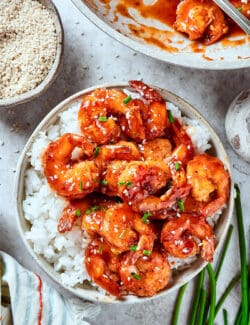 a bowl of rice with firecracker shrimp
