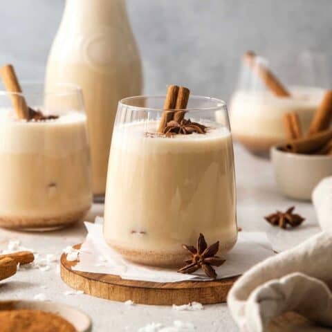 a glass of Puerto Rican coquito cocktail